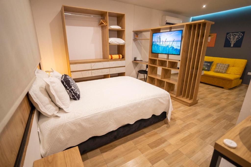 Postel nebo postele na pokoji v ubytování Caobos Center Coliving & Coworking