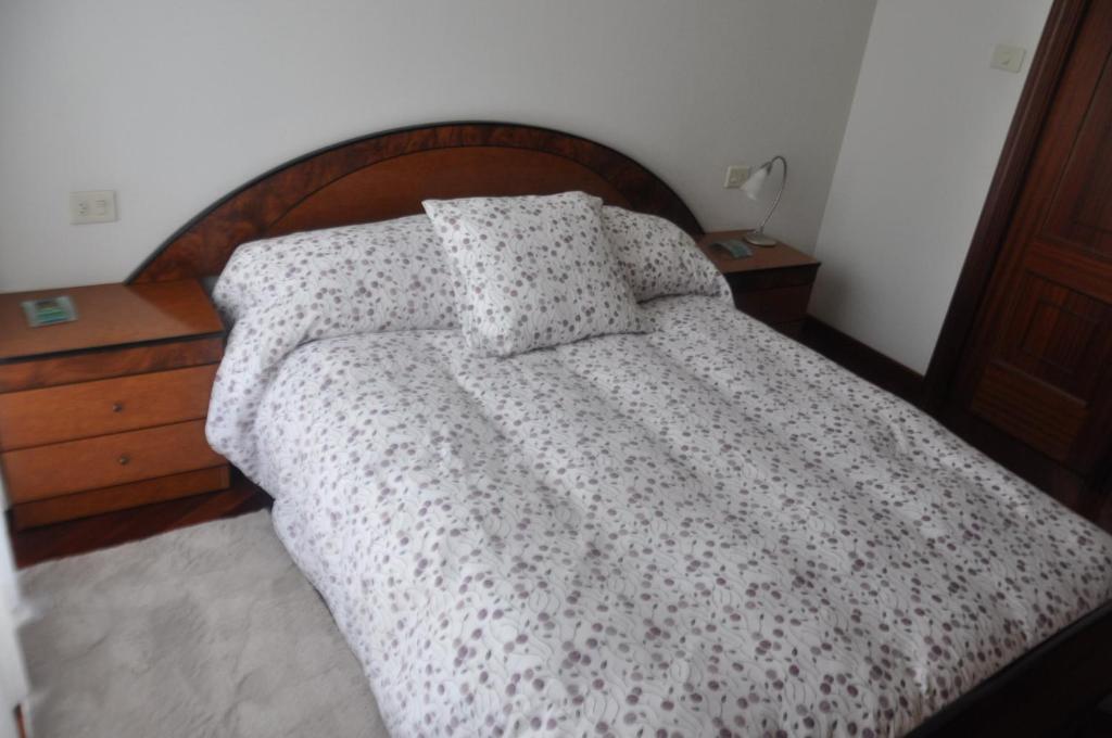 Postel nebo postele na pokoji v ubytování Monte Faro El corazón de Galicia