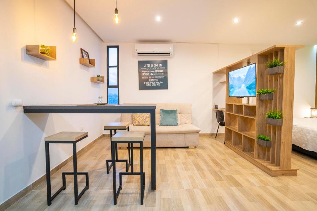 TV a/nebo společenská místnost v ubytování Caobos Center Coliving & Coworking
