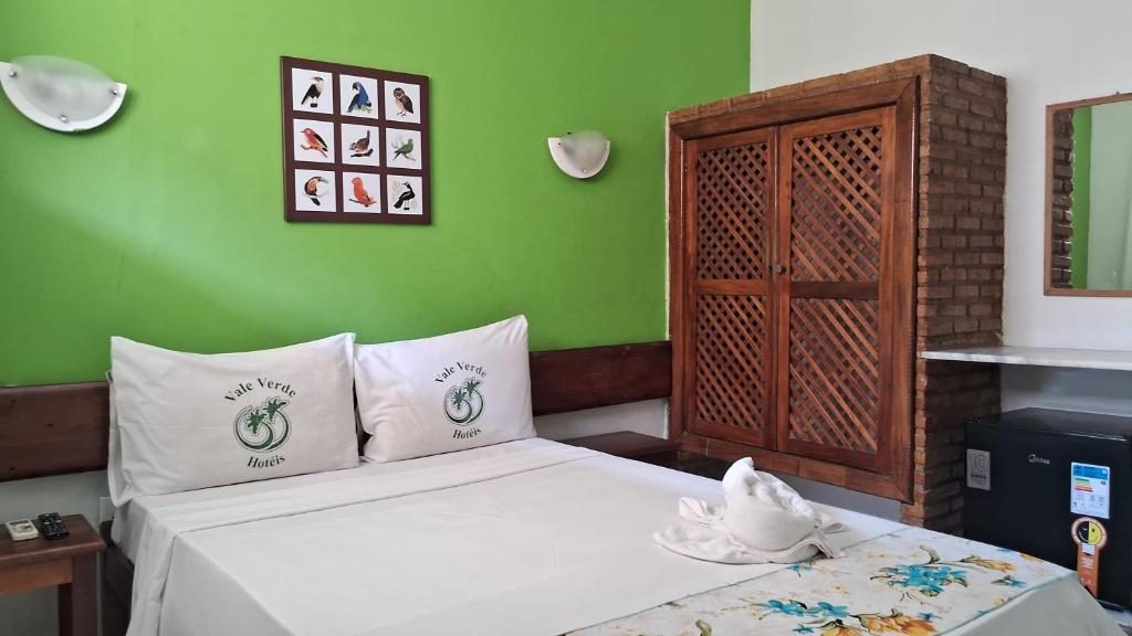 Postel nebo postele na pokoji v ubytování Hotel Costa Verde