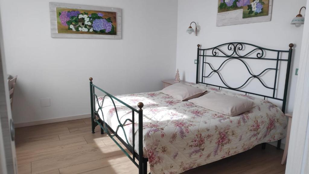 Posteľ alebo postele v izbe v ubytovaní B&B Mimosa e Lillà