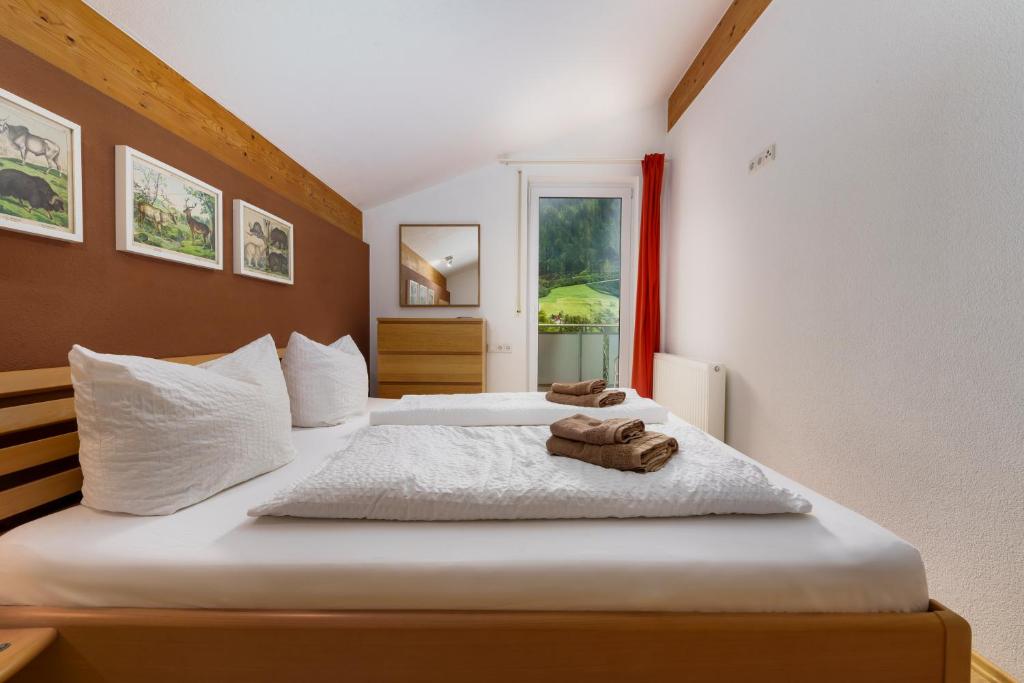 Postel nebo postele na pokoji v ubytování Haus Röcken