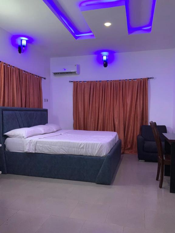 Postel nebo postele na pokoji v ubytování JCB Hotel