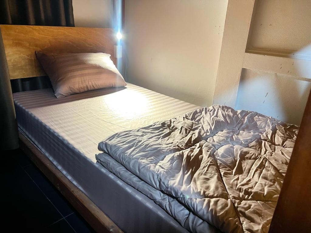 Postel nebo postele na pokoji v ubytování Sleep like a baby Hostel Pattaya