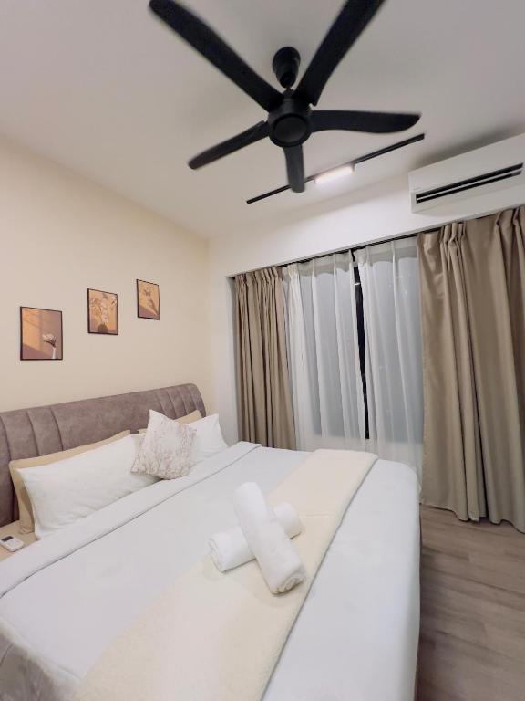 Postel nebo postele na pokoji v ubytování Agile TRX Luxury suite Bukit bintang