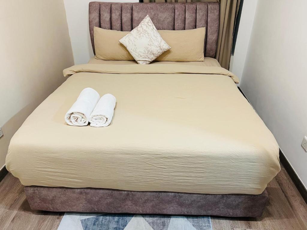 Postel nebo postele na pokoji v ubytování Agile TRX Luxury suite Bukit bintang
