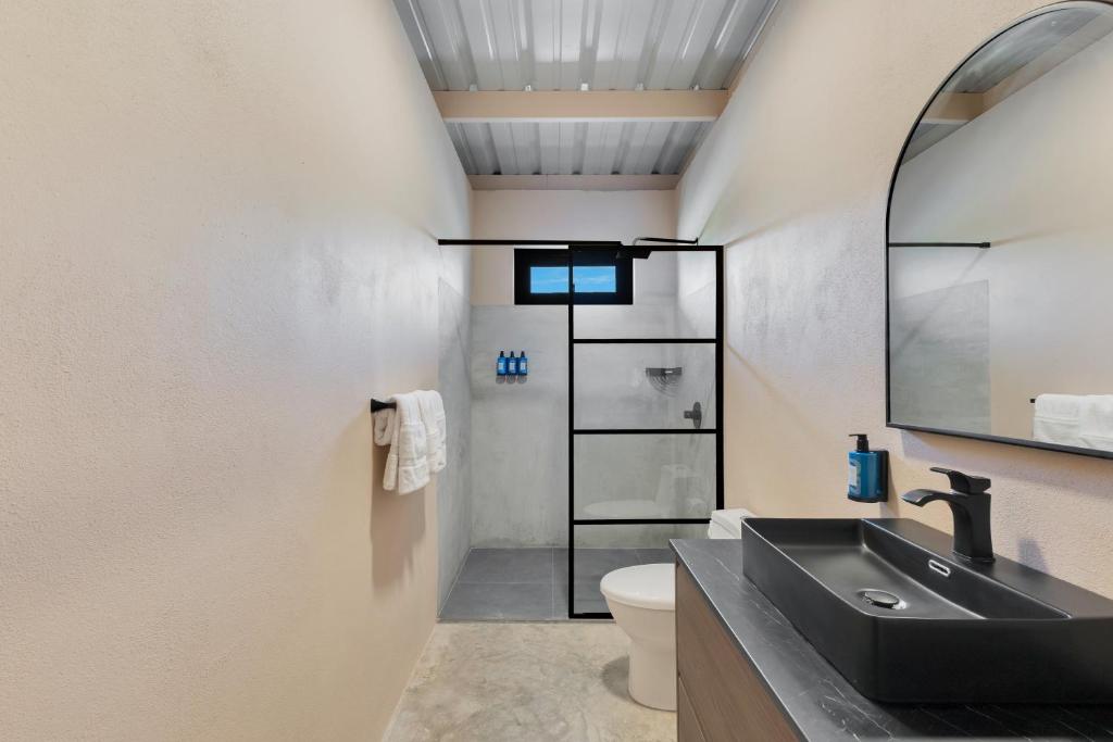 Kuchyň nebo kuchyňský kout v ubytování Aguadilla Surf Lodge