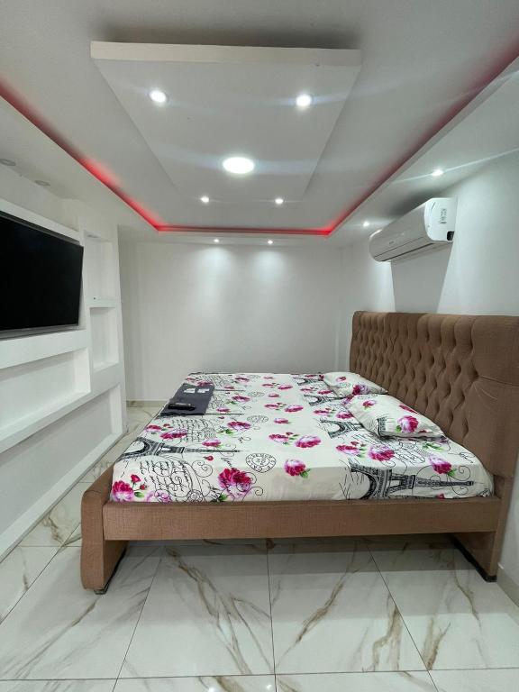Postel nebo postele na pokoji v ubytování Hostal Las Orquideas 2