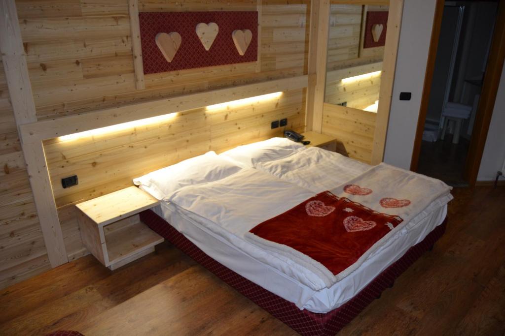 Postel nebo postele na pokoji v ubytování Hotel Cova