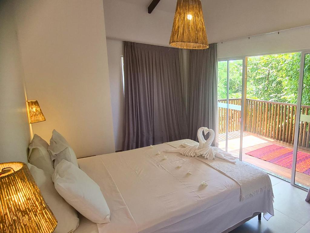 Een bed of bedden in een kamer bij Casa Duna - Family Friendly