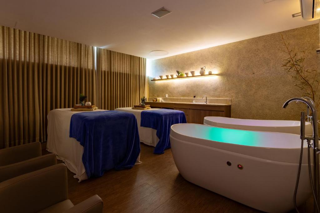 Foto da galeria de eSuites Lagoa Santa em Lagoa Santa