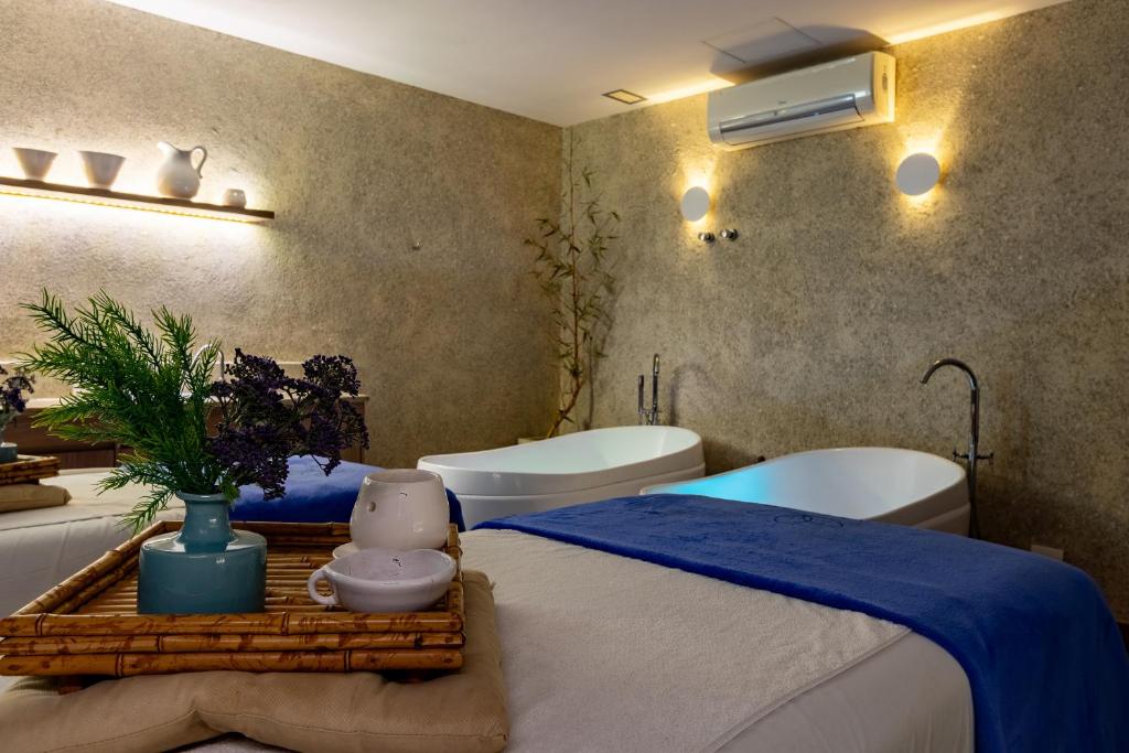 Spa e/ou outras comodidades de bem-estar em eSuites Lagoa Santa