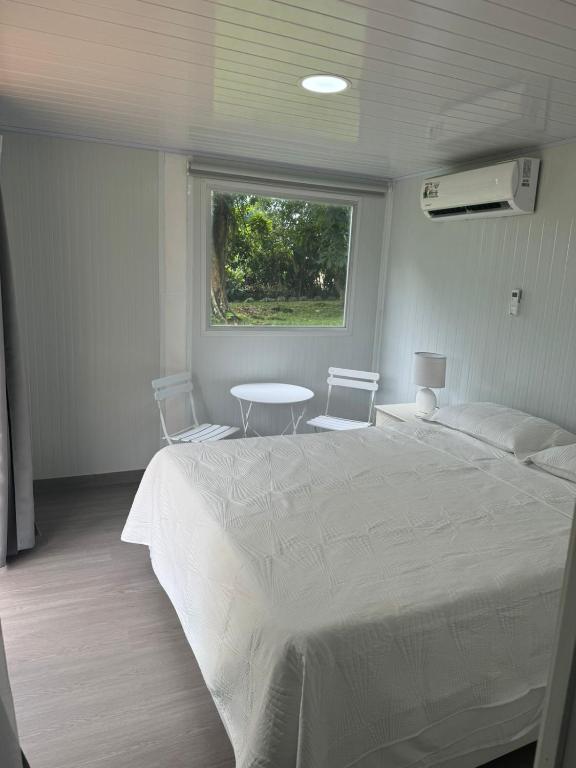 Postel nebo postele na pokoji v ubytování Cautiva Sleep Inn