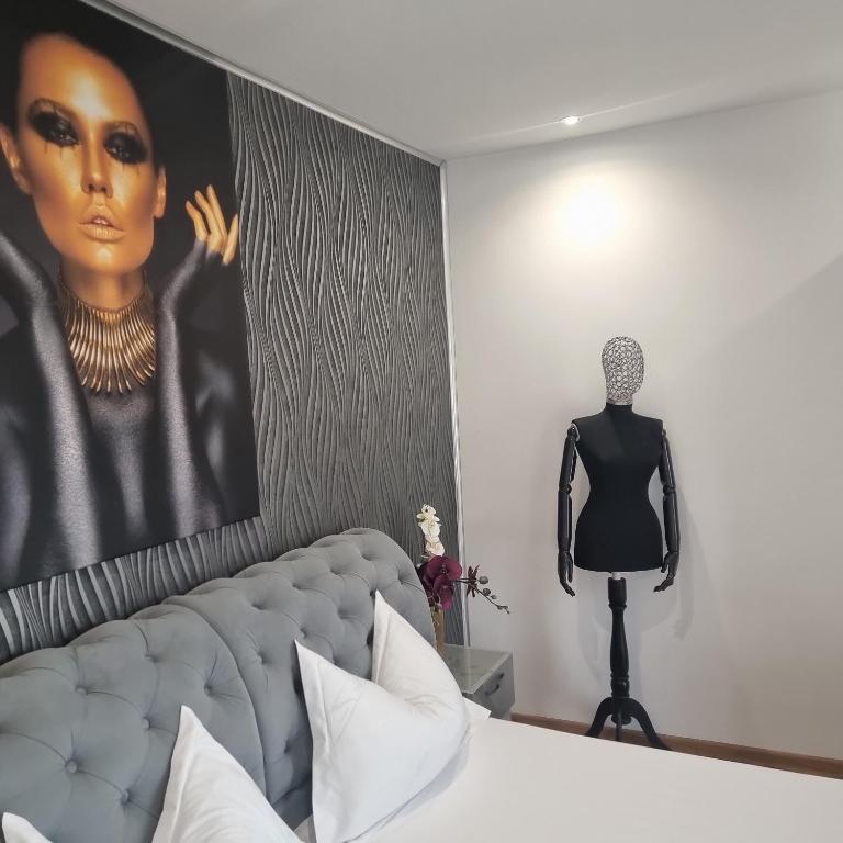 Postel nebo postele na pokoji v ubytování Casa Petcu