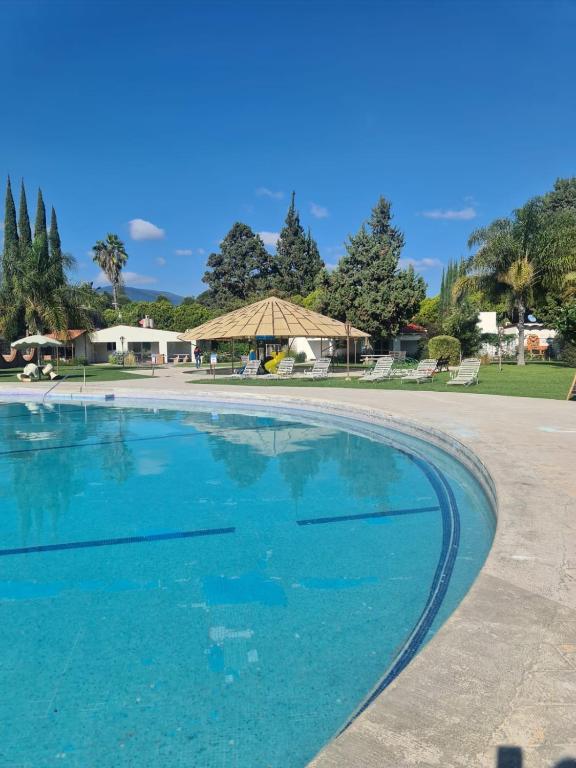Bazén v ubytování roca azul cabañas sa de cv nebo v jeho okolí