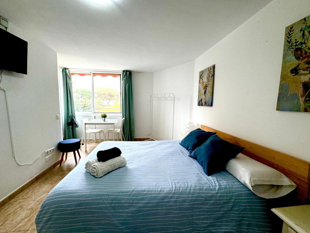 Postel nebo postele na pokoji v ubytování Cozy Studio Near The Beach