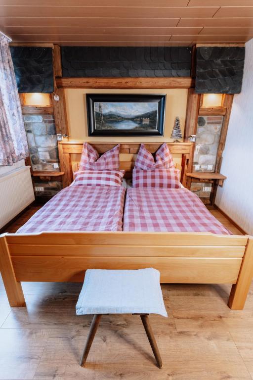 Voodi või voodid majutusasutuse Waldhotel Weitblick toas