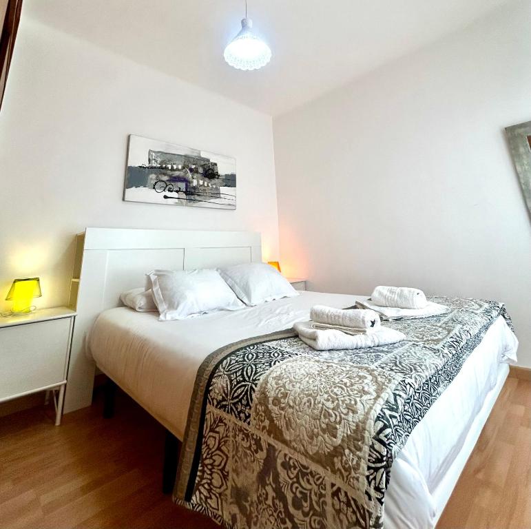 Posteľ alebo postele v izbe v ubytovaní Apartment carrer d'Olesa