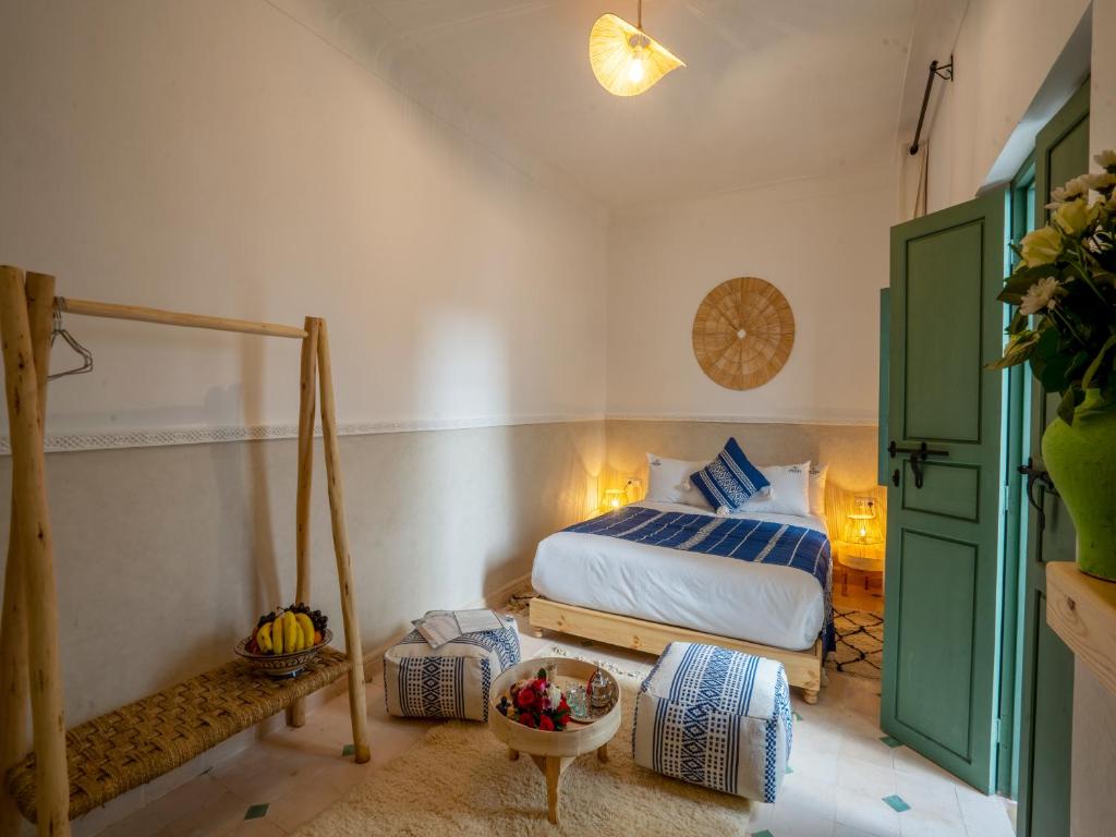 Postel nebo postele na pokoji v ubytování Yacouta Riad and Spa