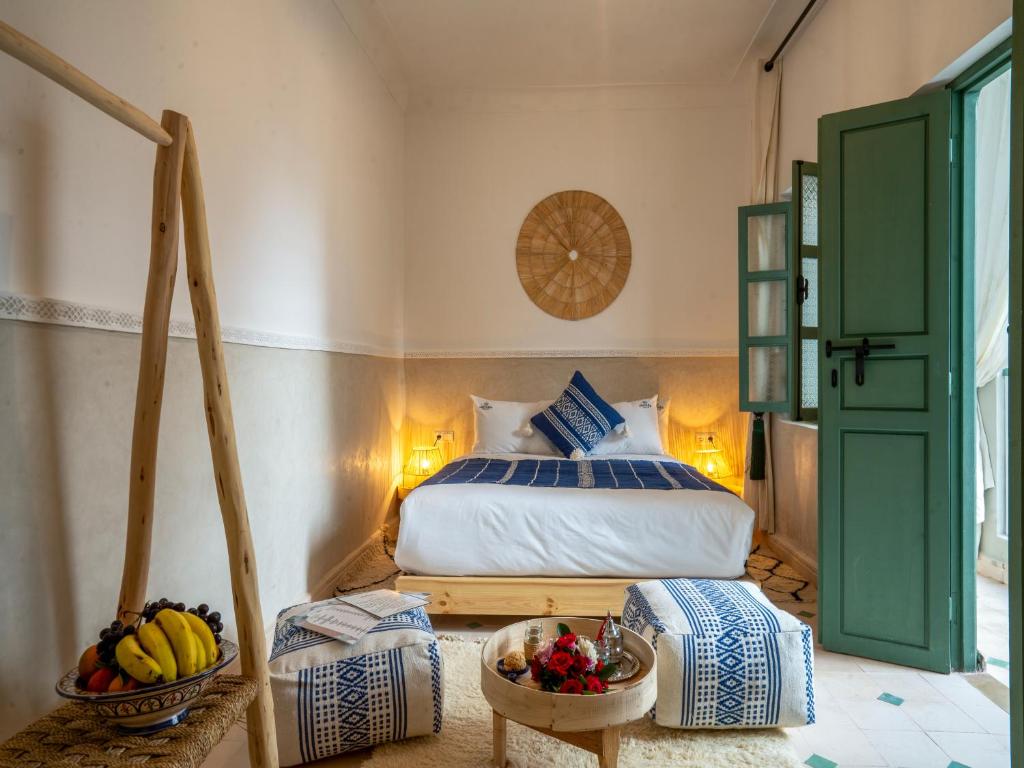 Postel nebo postele na pokoji v ubytování Yacouta Riad and Spa
