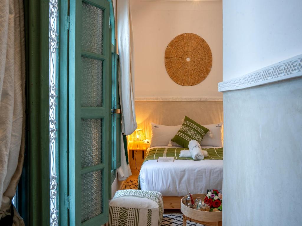 Postel nebo postele na pokoji v ubytování Yacouta Riad and Spa