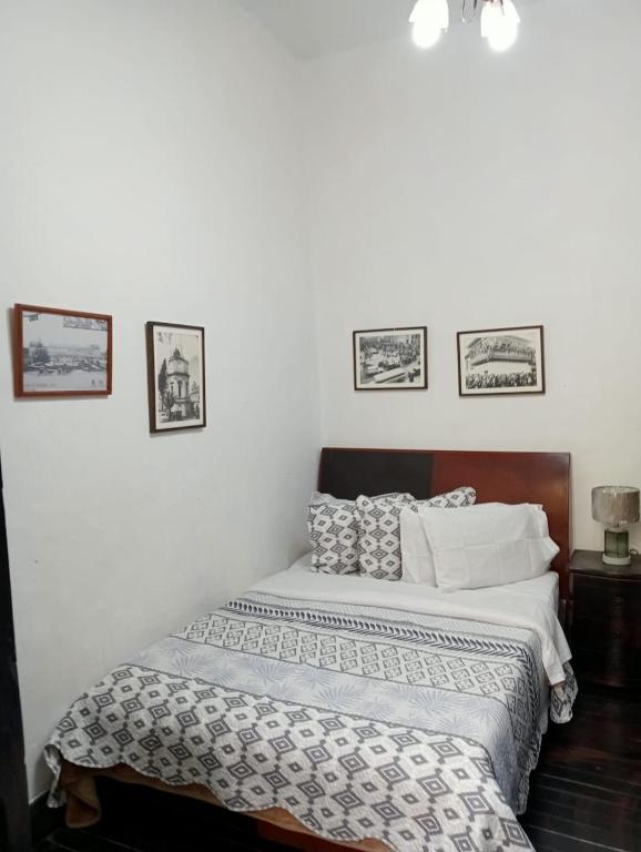 Postel nebo postele na pokoji v ubytování Hostal Hanoi en Bogotá