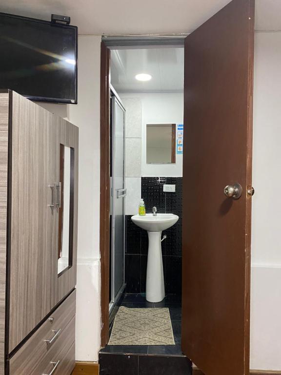 Kuchyň nebo kuchyňský kout v ubytování Hotel Quintas de Bogotá