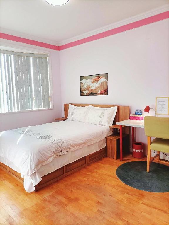 Postel nebo postele na pokoji v ubytování Warm Retreat