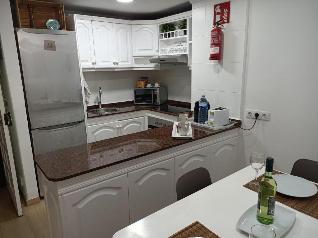 Kuchyň nebo kuchyňský kout v ubytování YourCanterasBeachApartment