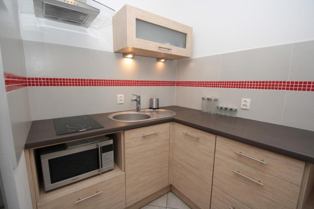 Kuchyňa alebo kuchynka v ubytovaní 100-SIO Apartamenty