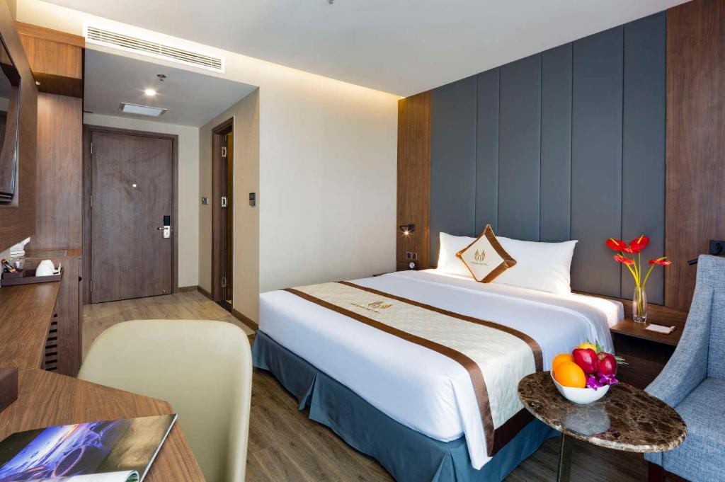 Giường trong phòng chung tại Vesna Hotel Nha Trang