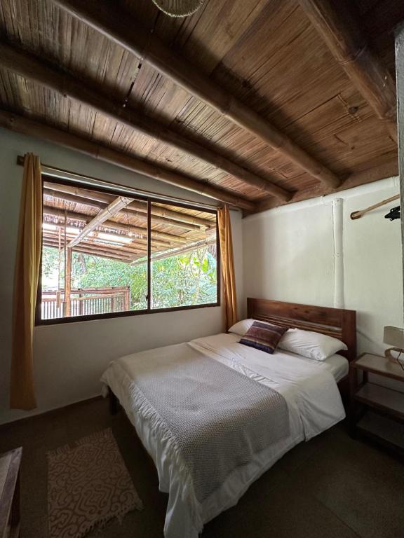 Postel nebo postele na pokoji v ubytování Cinnamon House