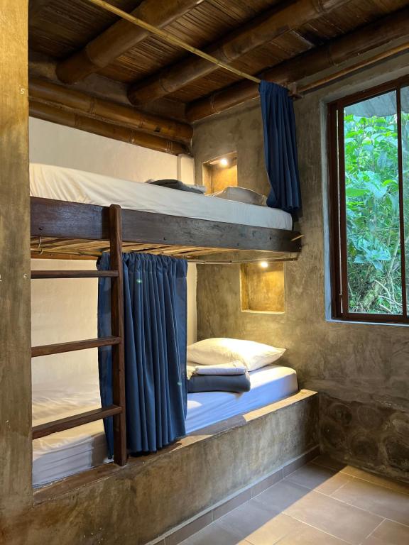 Postel nebo postele na pokoji v ubytování Cinnamon House