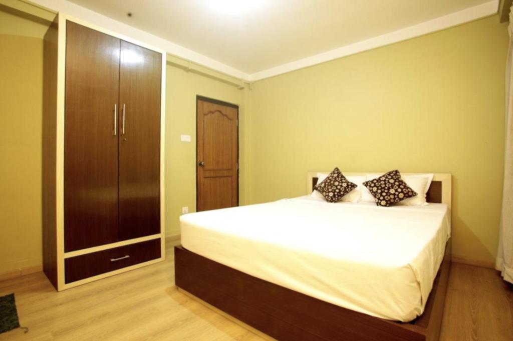 Postel nebo postele na pokoji v ubytování Nag Pukhu Guest House
