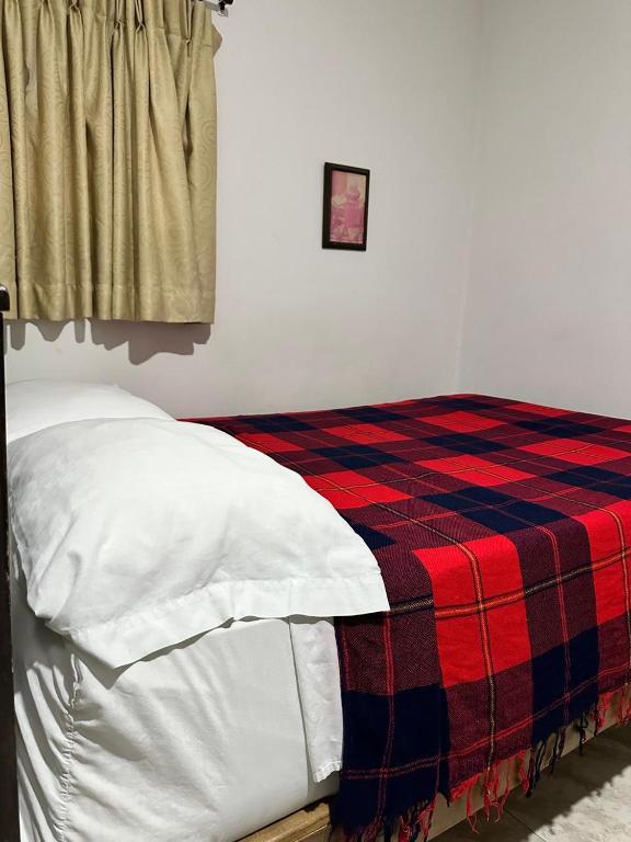 Postel nebo postele na pokoji v ubytování Hotel Plaza Real Pereira