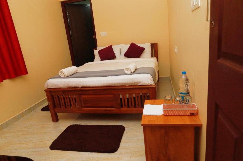 Postel nebo postele na pokoji v ubytování Jia Hill view rooms vagamon