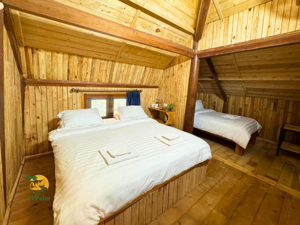 Postel nebo postele na pokoji v ubytování TVpalm Ecolodge