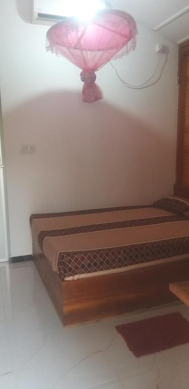 Postel nebo postele na pokoji v ubytování Dots bey beach cabana uppuveli