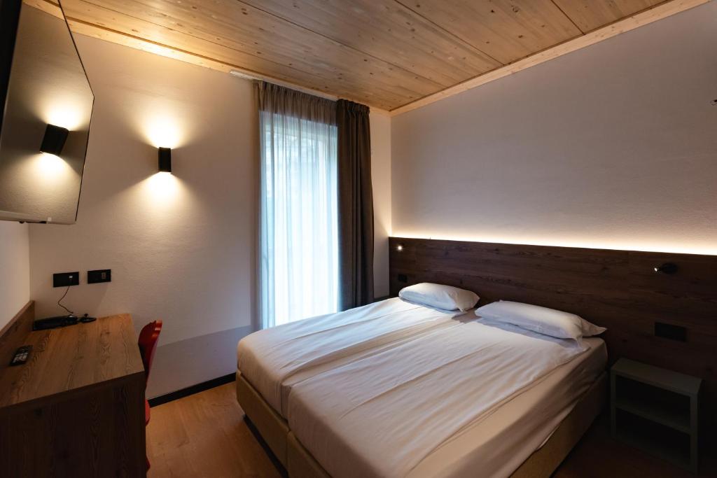 Postel nebo postele na pokoji v ubytování mySHH
