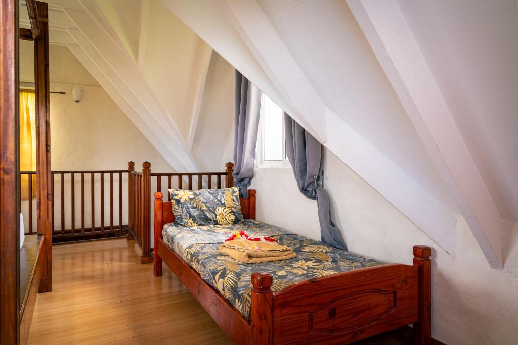 Postel nebo postele na pokoji v ubytování Lemongrass Lodge