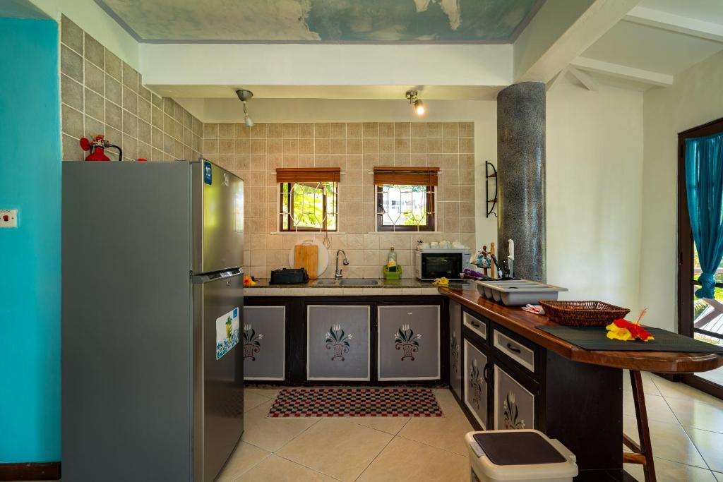 Kuchyň nebo kuchyňský kout v ubytování Lemongrass Lodge