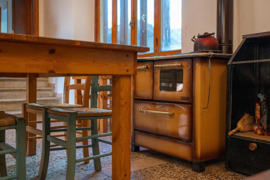 Kuchyň nebo kuchyňský kout v ubytování Rifugio Asqua