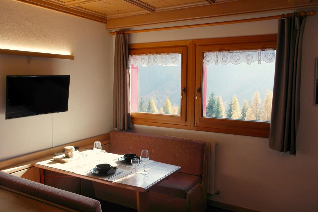 TV a/nebo společenská místnost v ubytování Valles Vacanze