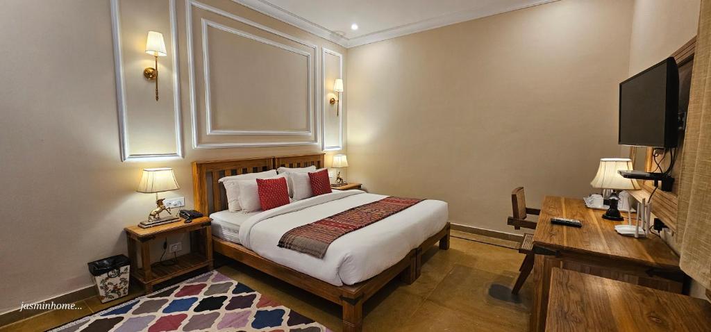 Postel nebo postele na pokoji v ubytování Hotel Jasmin Home