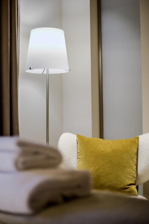 Postel nebo postele na pokoji v ubytování Hotel al Piolet