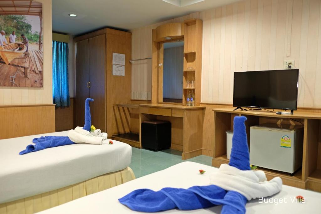 Postel nebo postele na pokoji v ubytování Andaman Lanta Resort - SHA Extra Plus