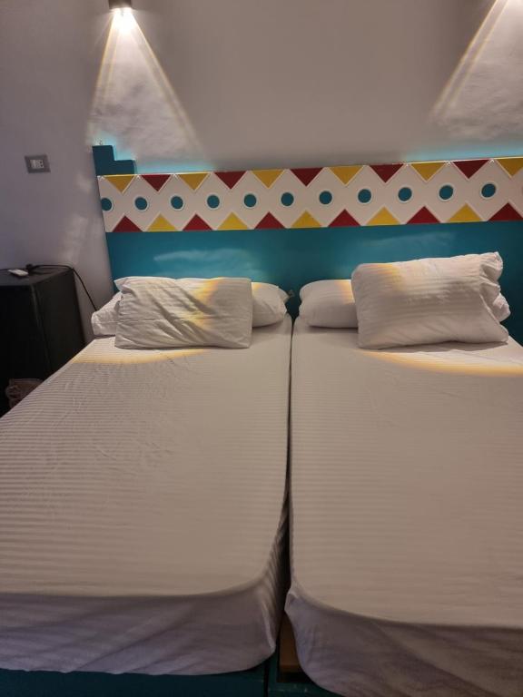 Postel nebo postele na pokoji v ubytování Baba Dool