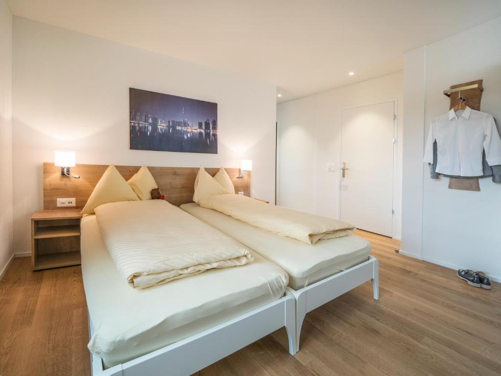 Postel nebo postele na pokoji v ubytování Aparthotel Bären