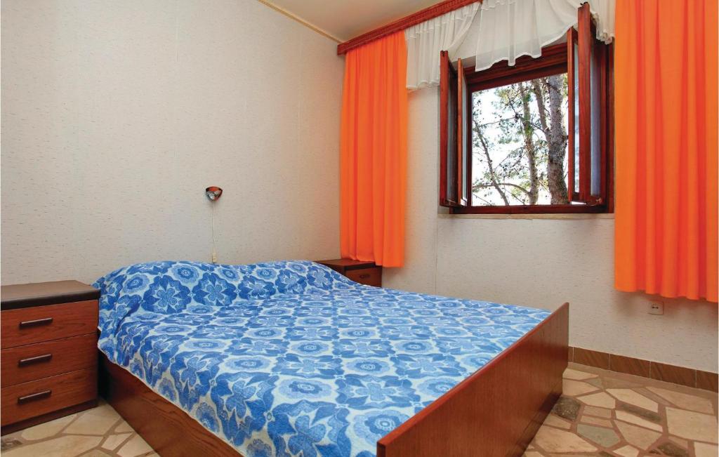 Łóżko lub łóżka w pokoju w obiekcie Holiday Home Prigradica Bb