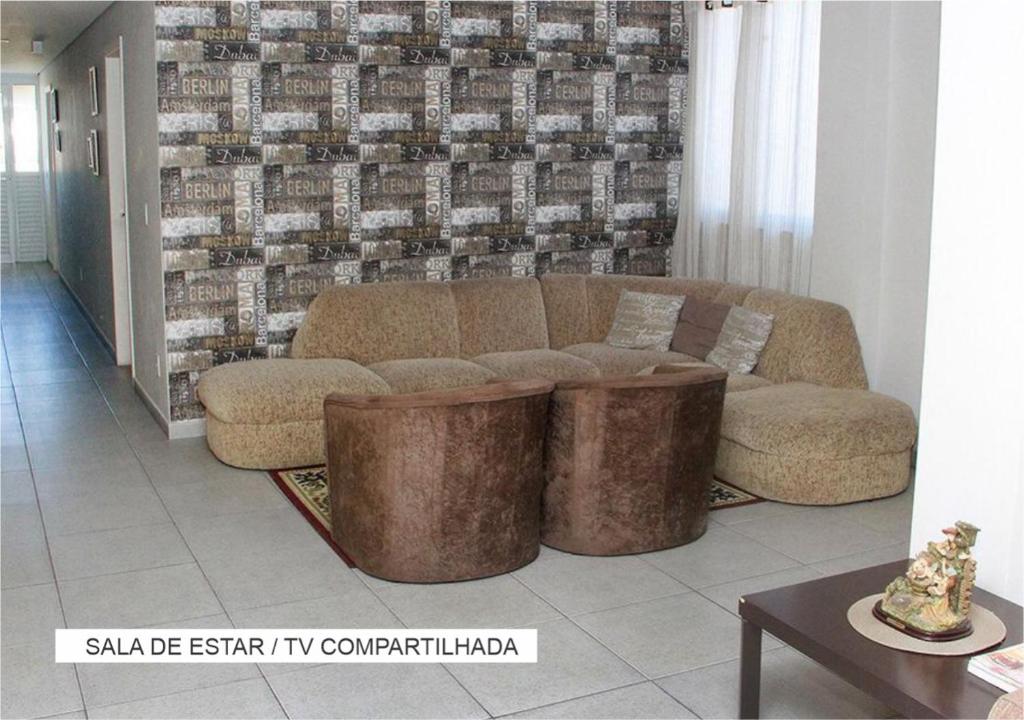 Posezení v ubytování Villa Tata Suítes Ltda